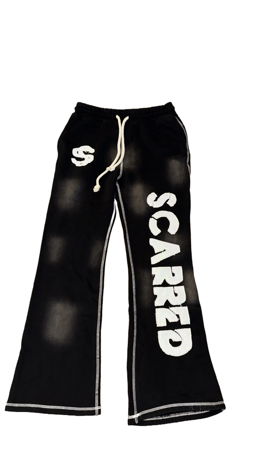 “Scarred” black sweats